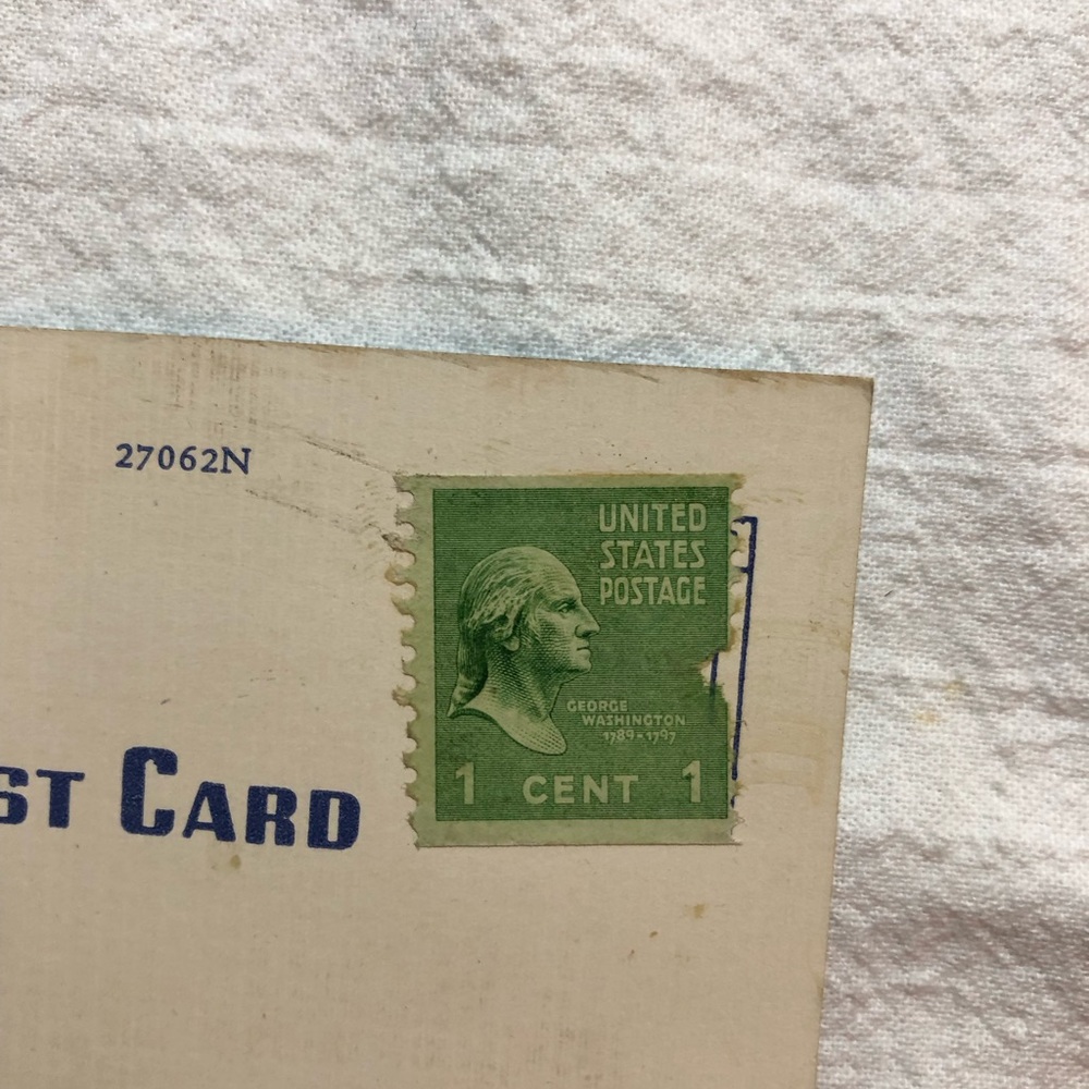 George Washington 1 cent stamp on vintage postcard. No postmark